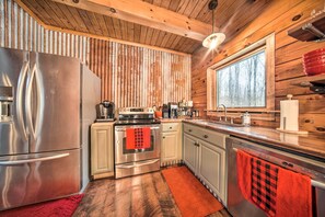 Fridge, microwave, stovetop, dishwasher - Panama Cabin on 36 Acres w/ Hot Tub & Trails! (Panama)