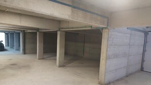 A construction site with exposed concrete pillars and a partially constructed wall. - Apartment in Lokva Rogoznica with Seaview, Terrace, Air condition, WIFI (5118-1) (Lokva Rogoznica)