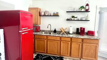 Fridge, microwave, coffee/tea maker, toaster