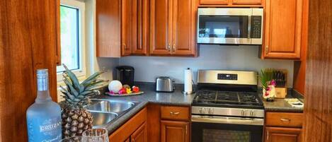 Fridge, microwave, stovetop, cookware/dishes/utensils