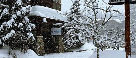 A snow-covered building with a sign for 'Northstar' and 'Butterbox' visible.