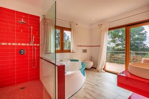 Bathtub, hair dryer, towels