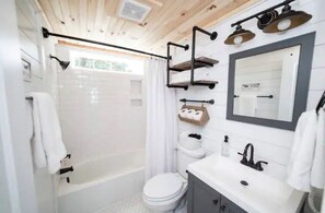 Hair dryer, towels, soap, shampoo
