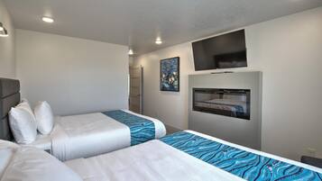 3 habitaciones, tabla de planchar con plancha y cuna de viaje