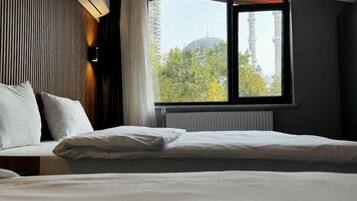 Habitación exclusiva | Sábanas de algodón egipcio y ropa de cama de alta calidad