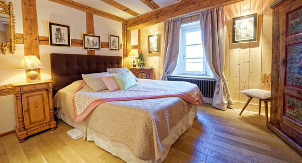1 bedroom, desk, iron/ironing board, travel crib