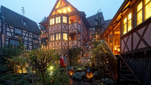 The Little Wolf***** romantic 5* nest with balcony overlooking the garden. Quiet