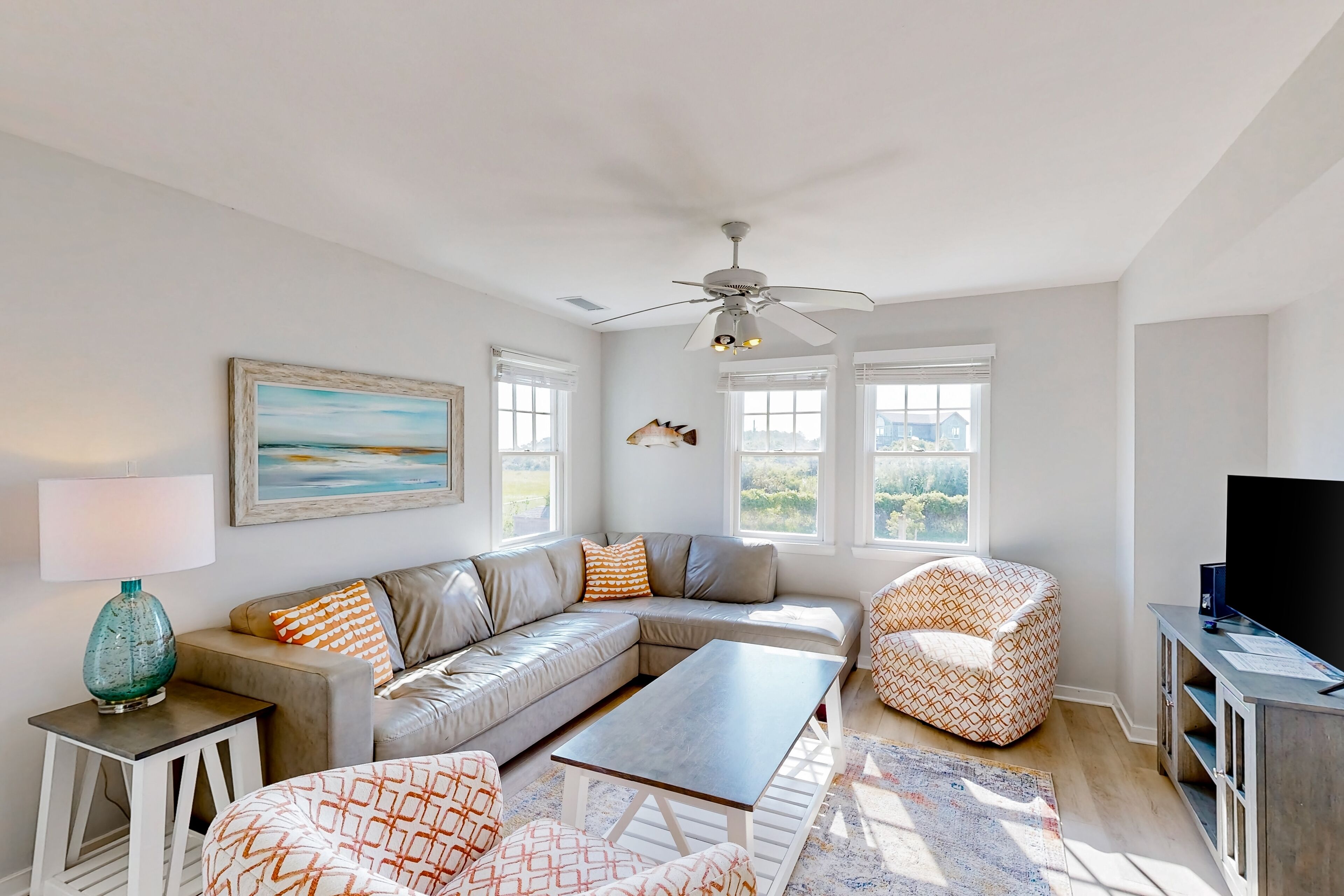 Dog-friendly ocean view townhouse w/ central AC, private W/D, & pool access