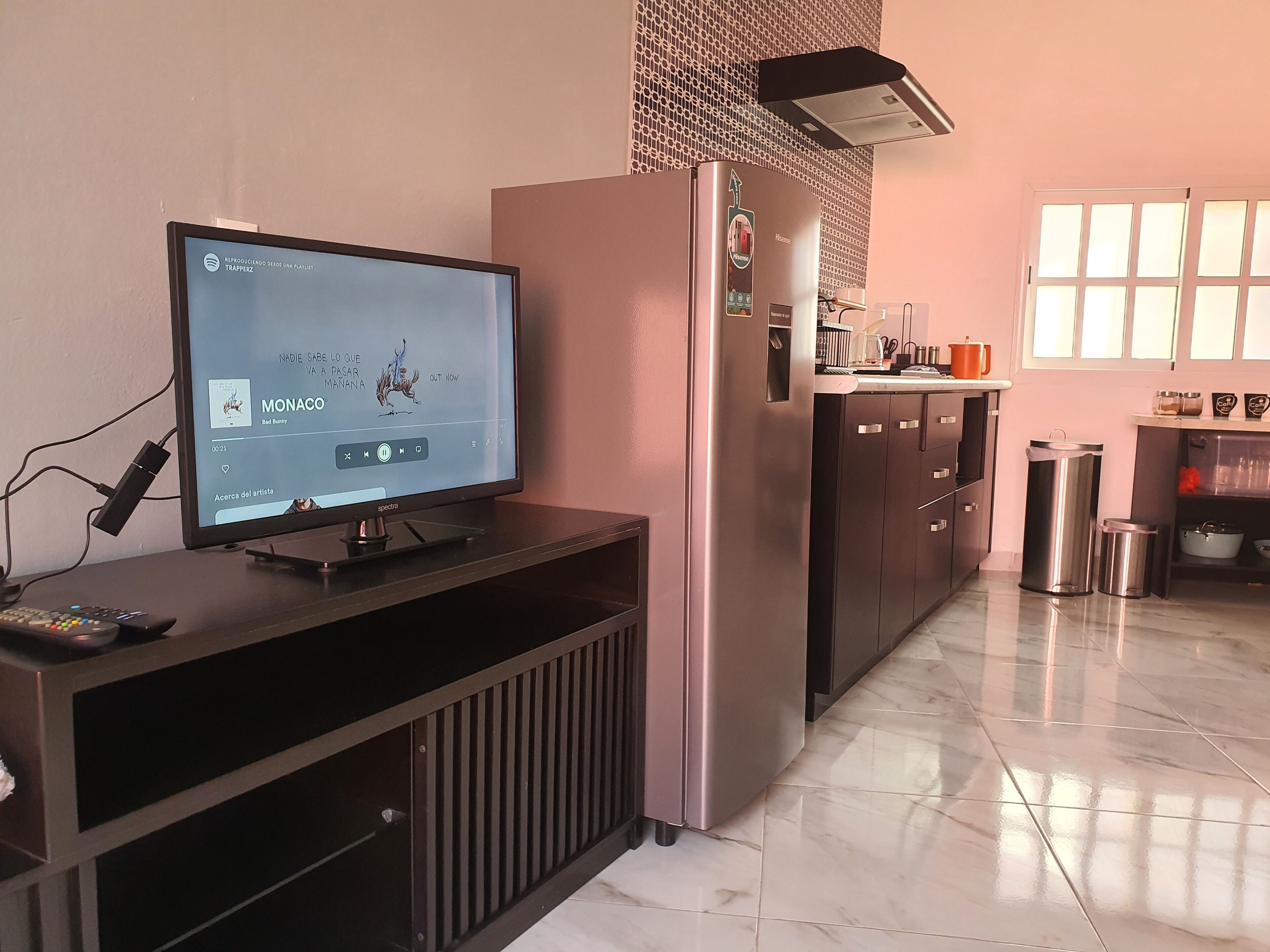 Fridge, microwave, coffee/tea maker, cookware/dishes/utensils