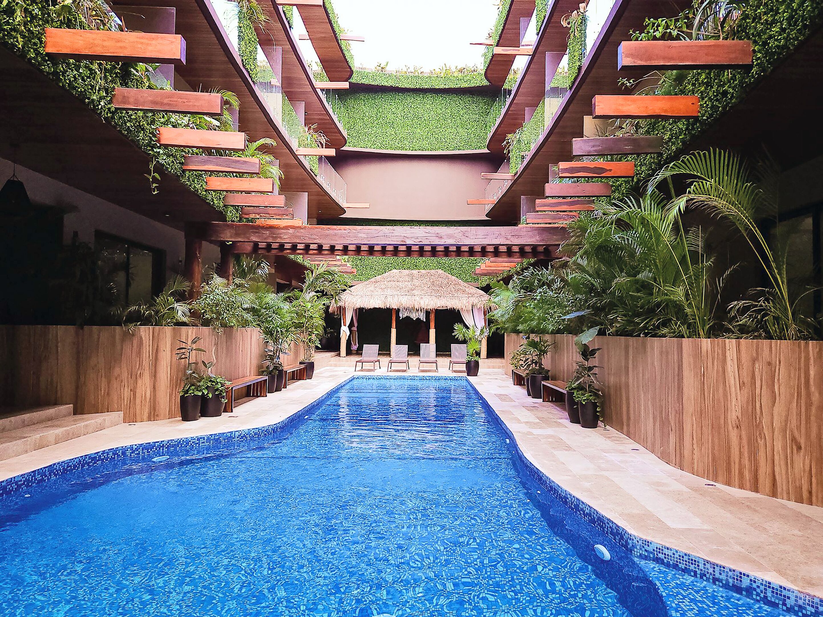 2 outdoor pools, open 9:00 AM to 10:00 PM, free cabanas, pool umbrellas
