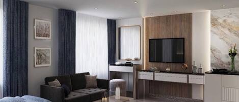 Ett modernt hotellrum med en soffa, ett soffbord, en TV och en minibar.