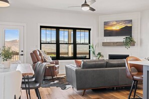 Smart TV, fireplace, books, offices