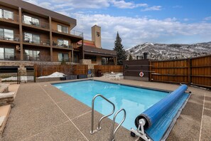A heated pool - *Summer Sale* Snow Flower 204 - Hot Tub & Heated Pool - Steps to Gondolas Square (Steamboat Springs)