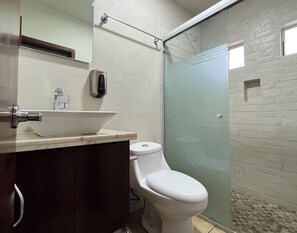 Comfort Condo | Bathroom | Free toiletries, hair dryer, towels