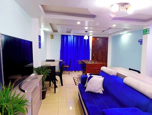 Télévision à écran plat de 31 pouces avec chaînes par câble, Netflix