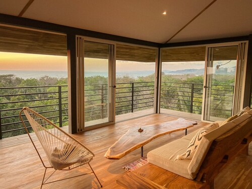 Modern Jungle Treehouse with Ocean Views and short walk to the Mal Pais Beaches.