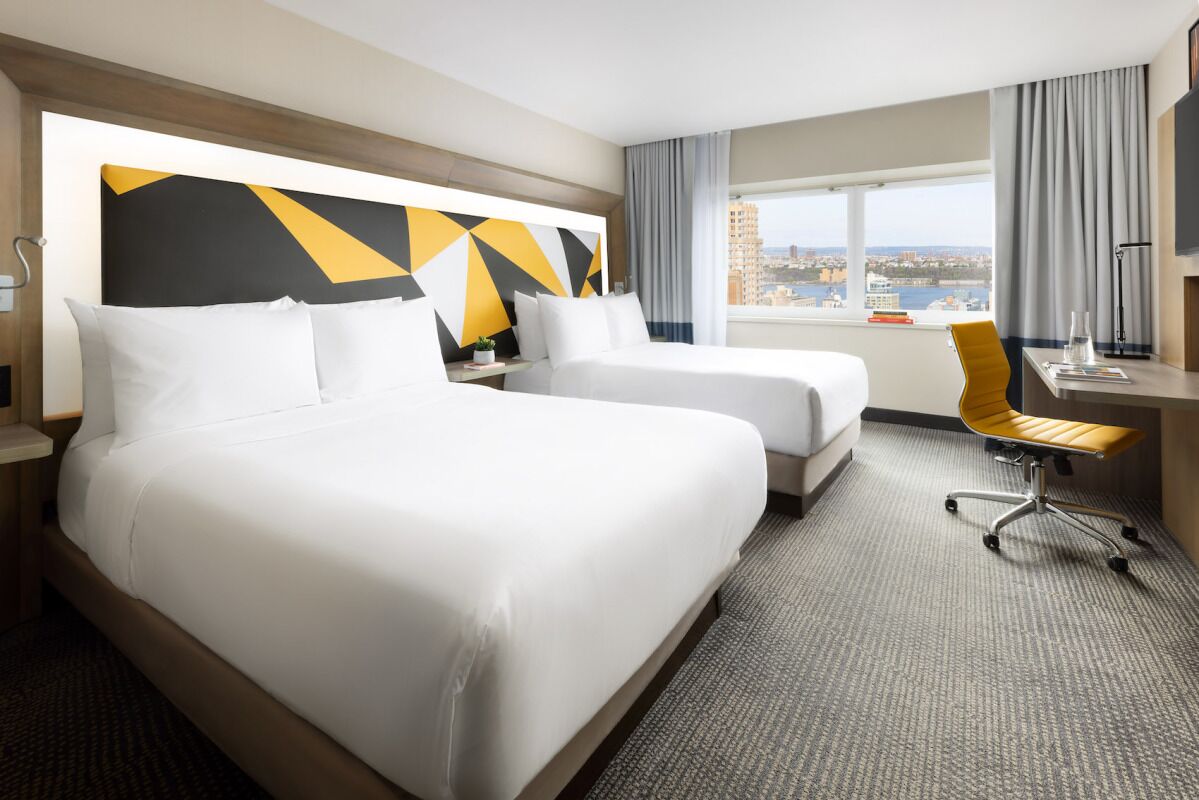 Explore More of the City that Never Sleeps! Unit Steps Away from Times Square!