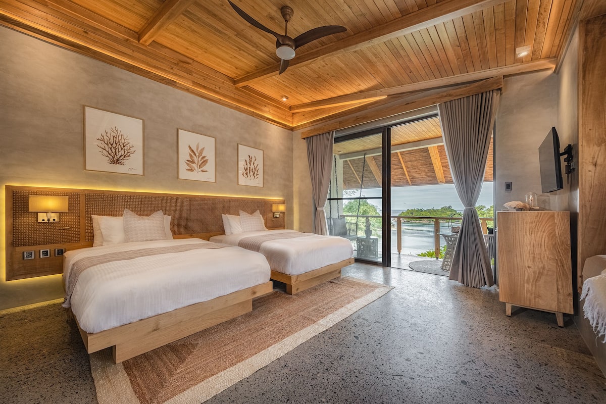 Oceanview Suites | Caja de seguridad en la habitación, wifi gratis y ropa de cama