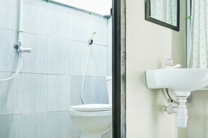 Shower, rainfall showerhead, towels, soap