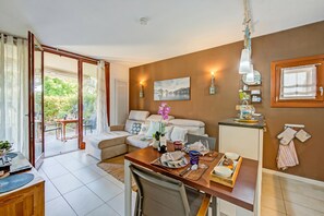 21-inch flat-screen TV with cable channels, TV