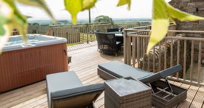 A cottage that sleeps 8 guests in 4 bedrooms