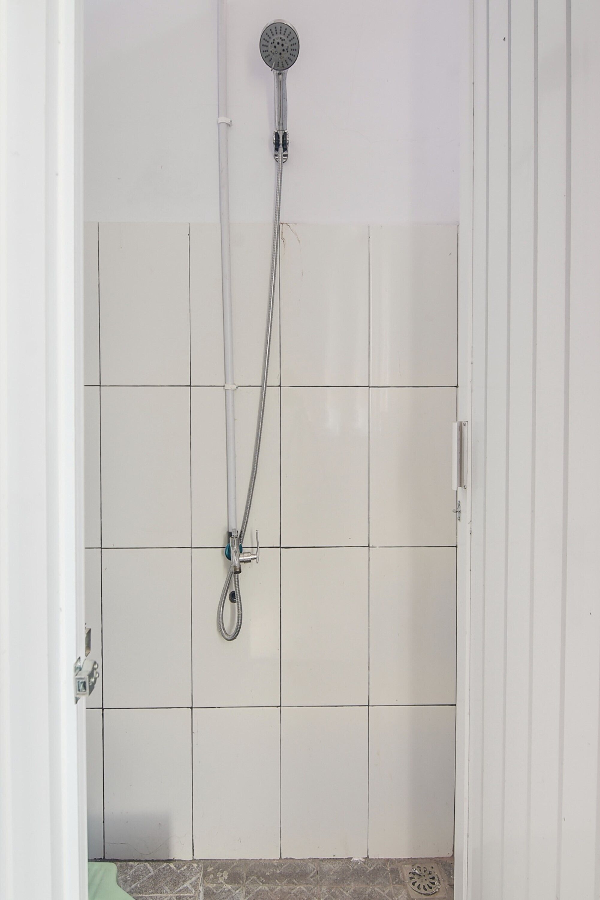 shower, rainfall showerhead, towels, toilet paper