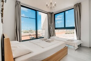 4 bedrooms, desk, iron/ironing board, travel cot