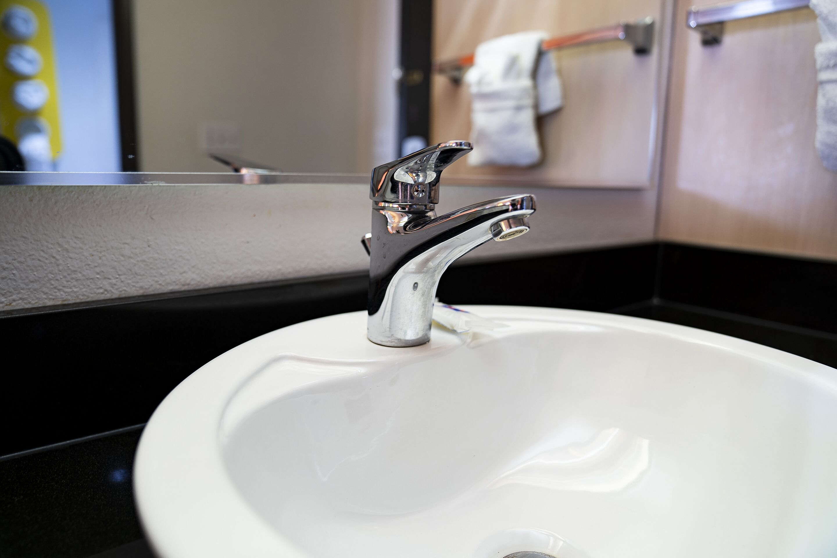 desk, iron/ironing board, alarm clocks