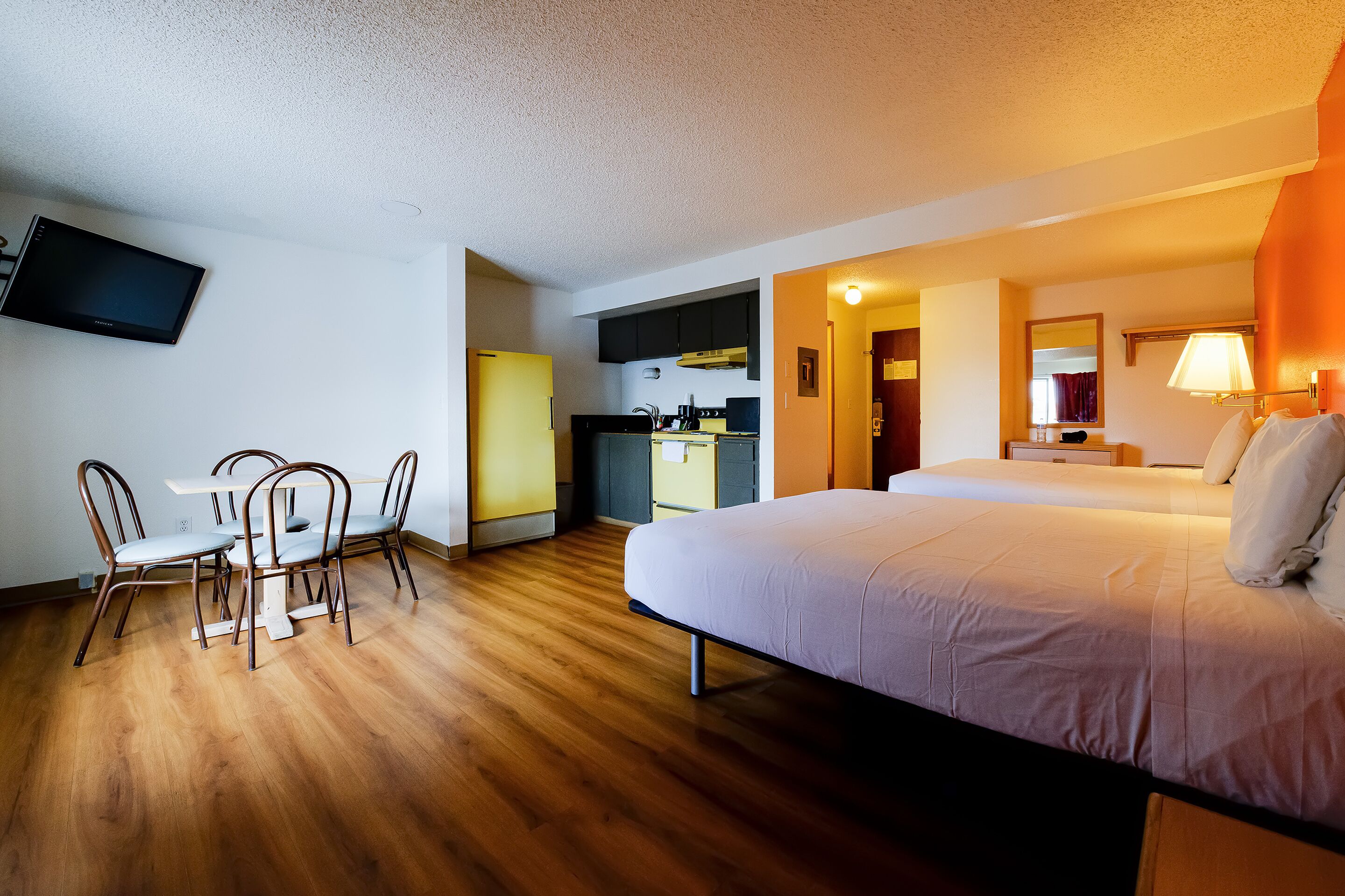 desk, iron/ironing board, alarm clocks