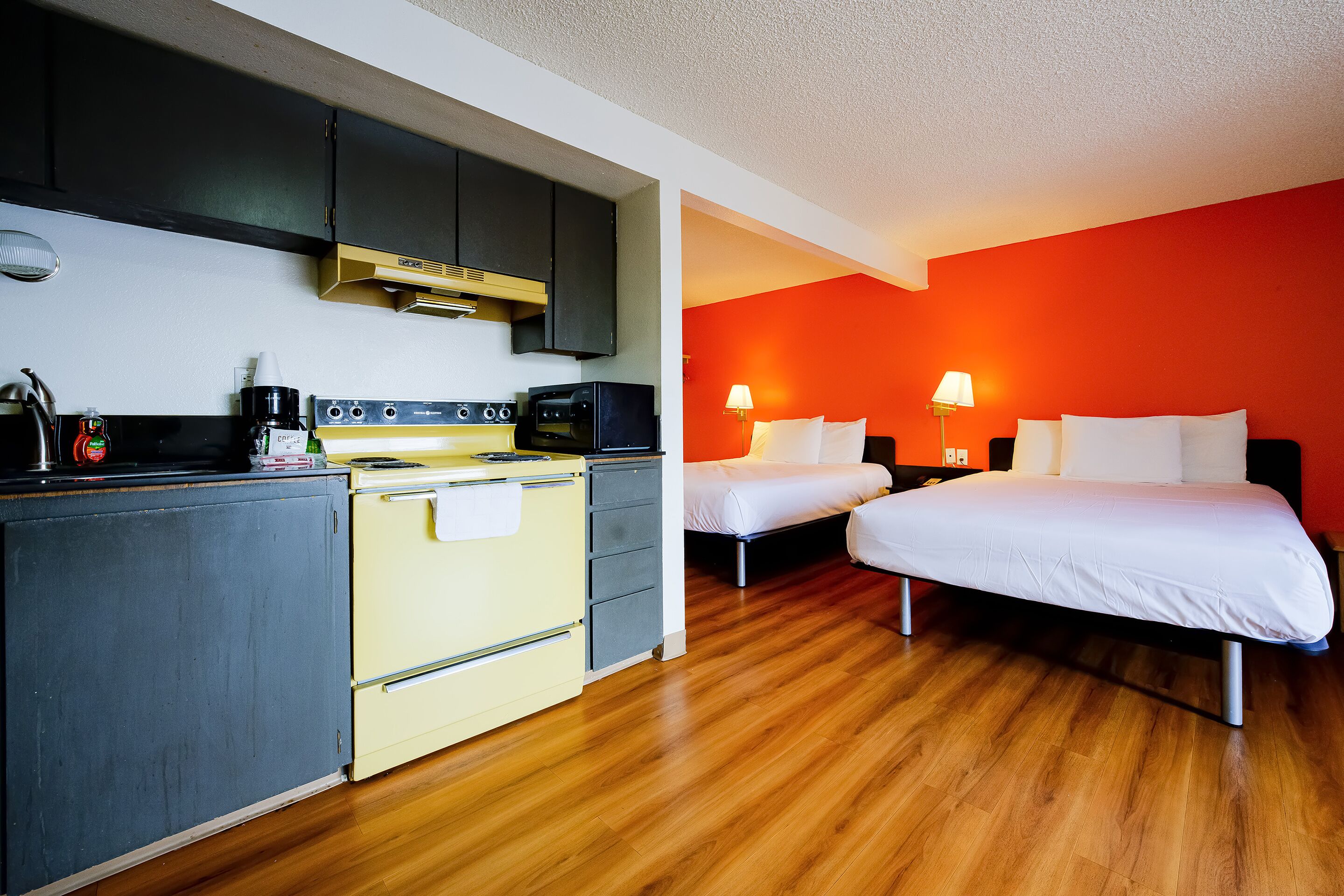 desk, iron/ironing board, alarm clocks