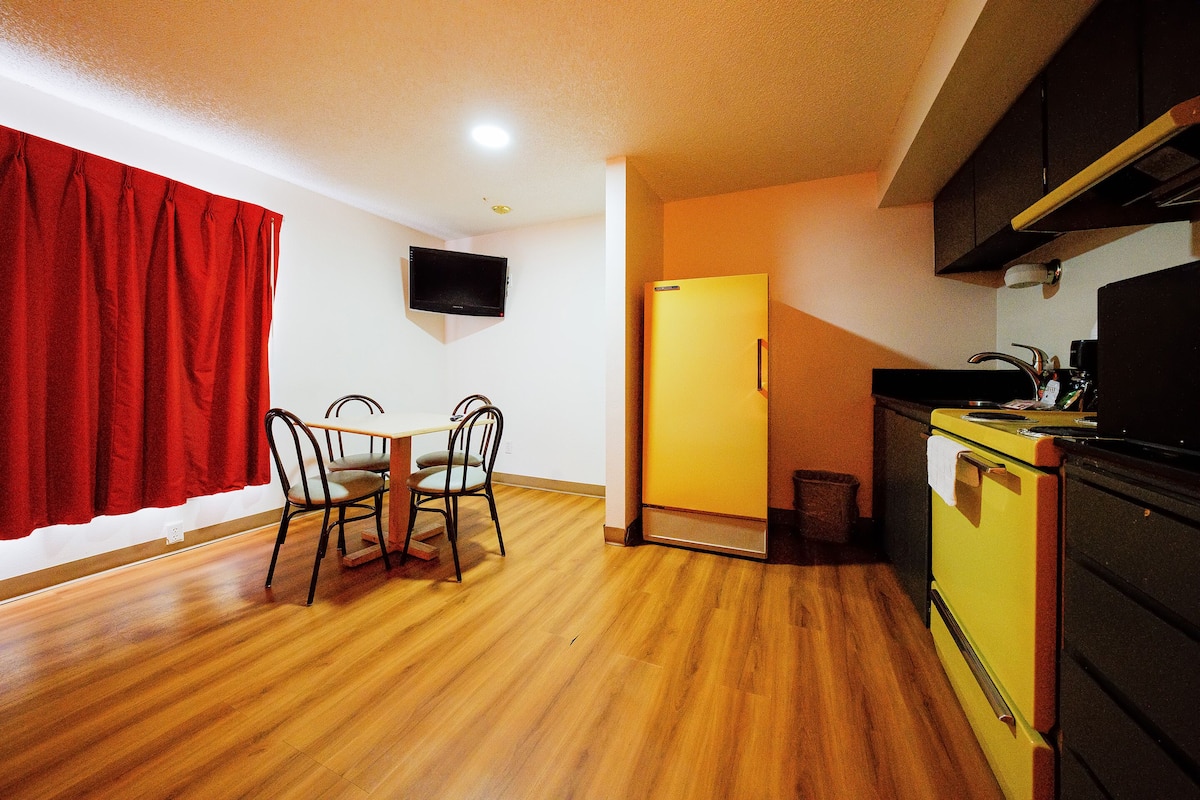 desk, iron/ironing board, alarm clocks