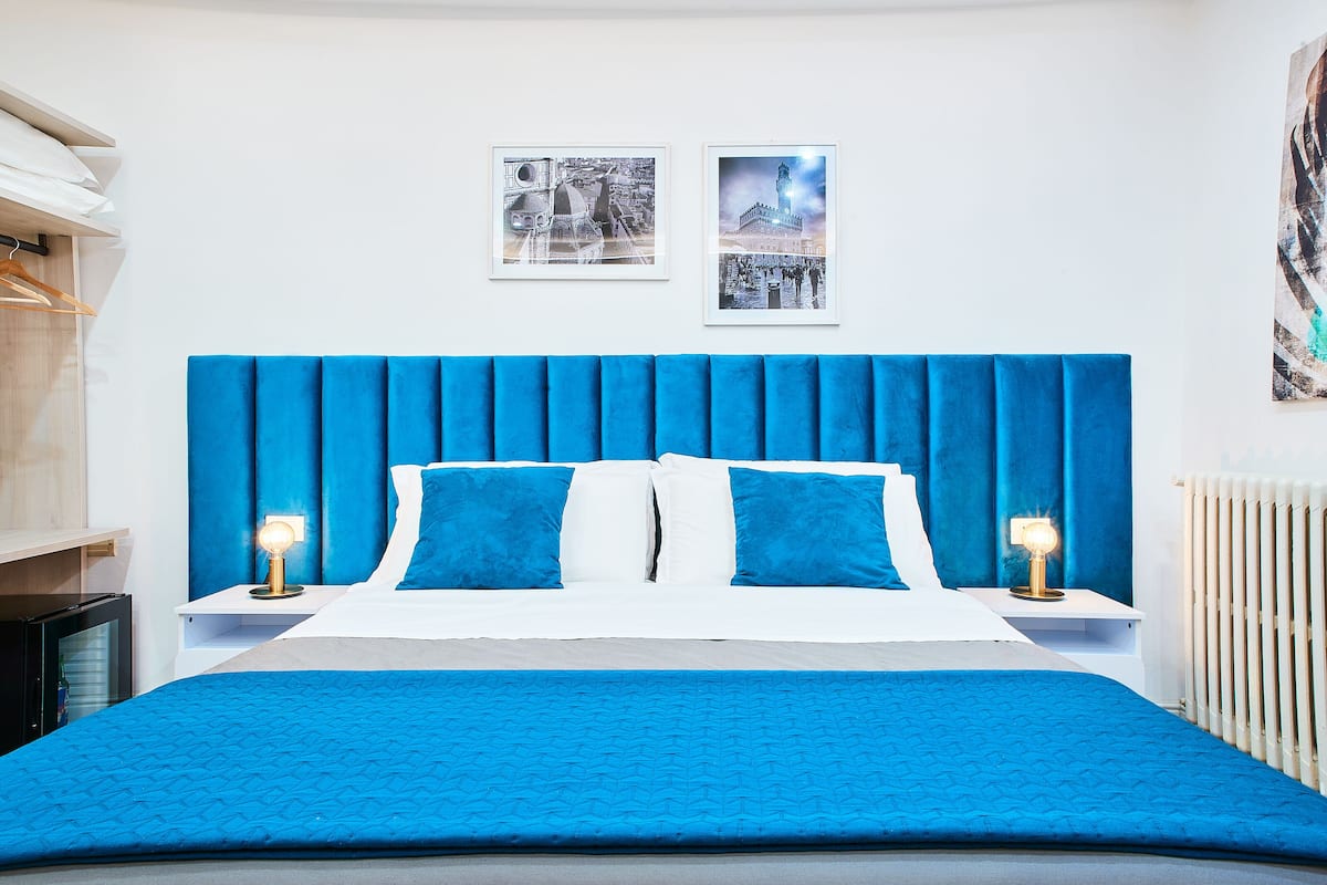 Deluxe vierpersoonskamer, meerdere bedden | Italiaanse Frette-lakens, luxe beddengoed, donzen dekbedden