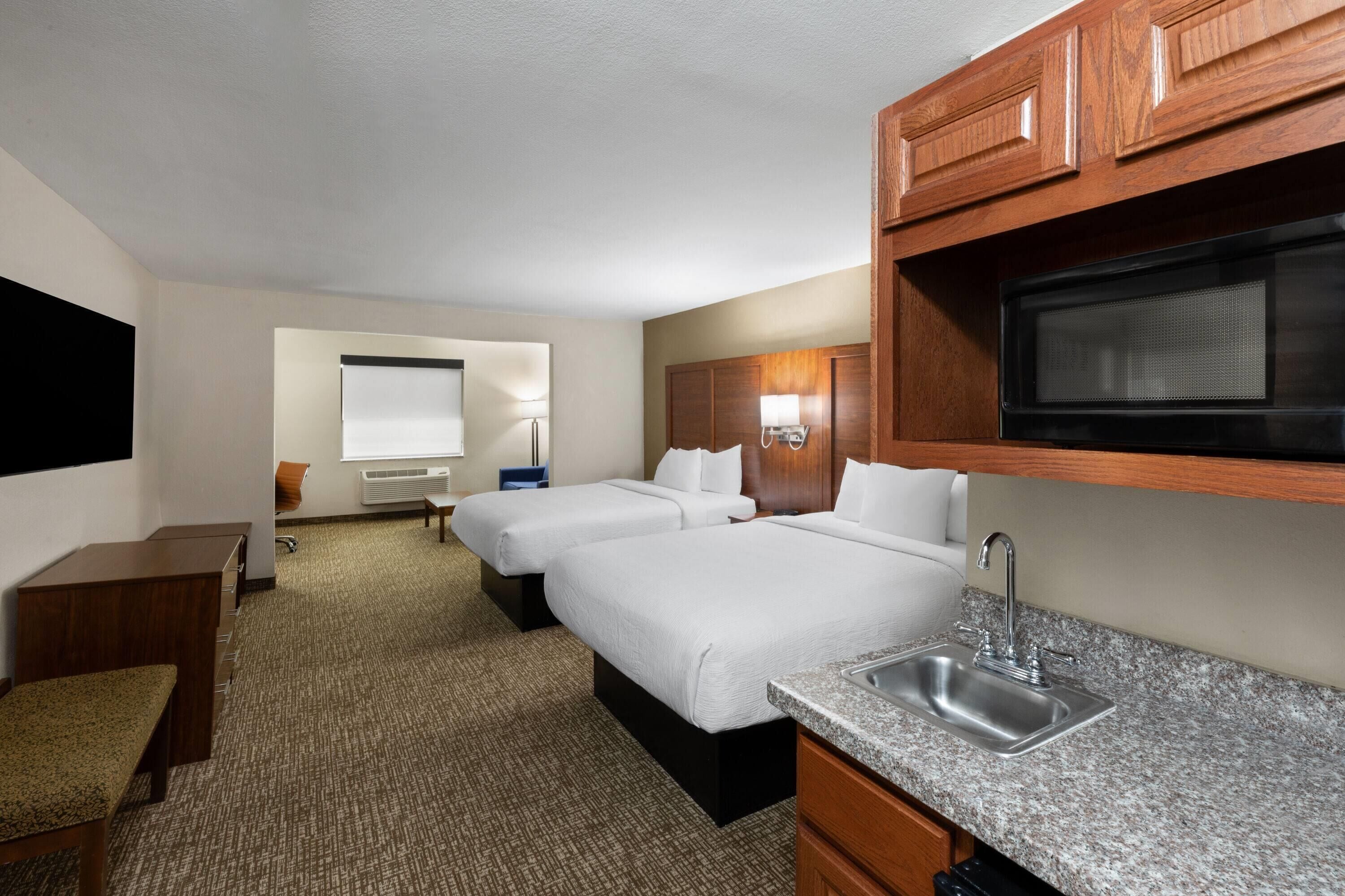 Suite, 2 Queen Beds, Mobility Accessible, Non Smoking (Mobility, Bathtub w/Grab Bars) | Premium bedding, individually decorated, individually furnished, desk