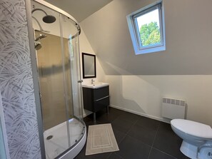 Shower, hair dryer, towels, soap