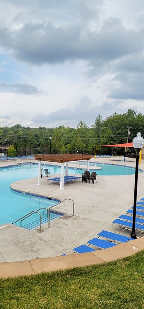 Seasonal outdoor pool, open 11:00 AM to 7:00 PM, sun loungers