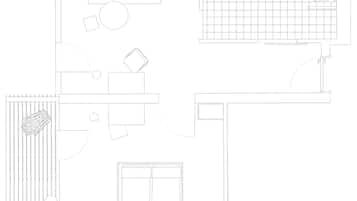 A floor plan with a kitchen, bathroom, and a seating area with a pool.