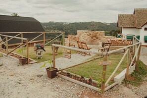Living area - Pousada Grom's Village (Campos do Jordão)