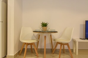Design Studio | In-room dining - GreenFuture - Contemporary Studio Amidst Top Places in JVC (Dubai)