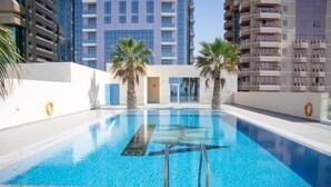 Outdoor pool - GreenFuture - Luxe Studio In Trade Center With Downtown Views (Dubai)