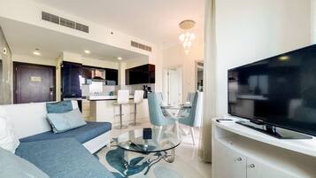 Classic Apartment | Living area | 55-inch Smart TV with cable channels, TV