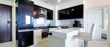 Classic Apartment | Private kitchen | Fridge, microwave, oven, stovetop