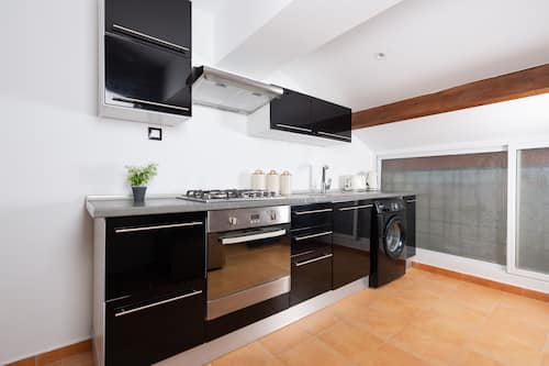 Appartement | Cuisine privée | Réfrigérateur, micro-ondes, four, plaque de cuisson