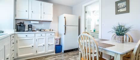 Fridge, microwave, stovetop, coffee/tea maker