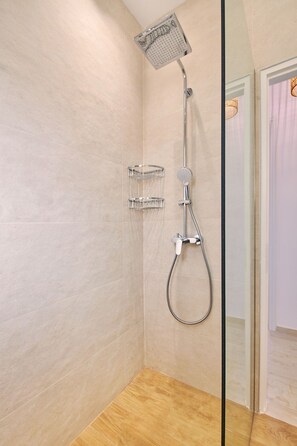 Hair dryer, towels, soap, shampoo