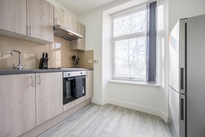 City Apartment, 1 Double Bed | Private kitchen | Electric kettle, paper towels - Church View 4 by Tŷ SA - Free parking (Newport)