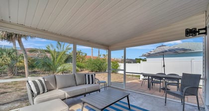 Updated tropical home with a private patio, beach gear, AC, and washer/dryer