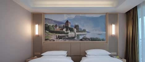 A hotel room with two beds, a mural of a scenic landscape, and two wall-mounted lamps.