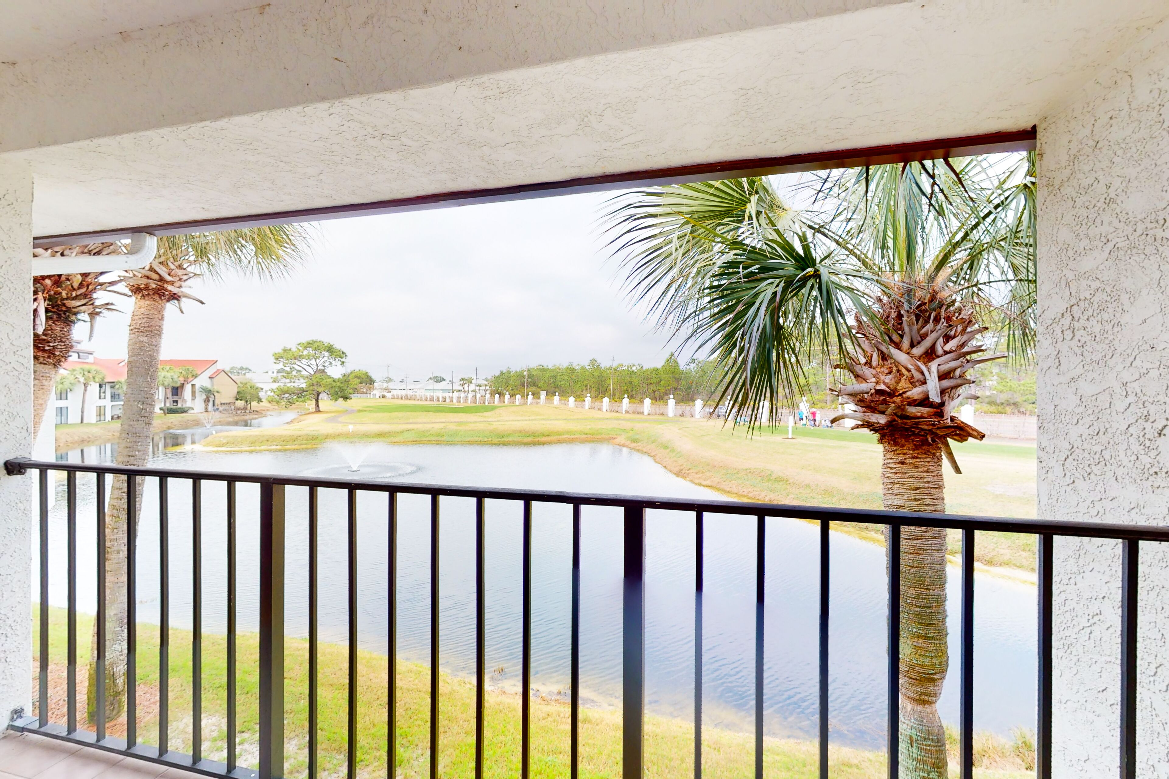 Golf-and-sea condo with pool, hot tub, golf, beach access, & private balcony