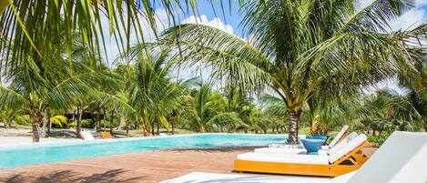 Outdoor pool, open 8:00 AM to 8:00 PM, free cabanas, sun loungers