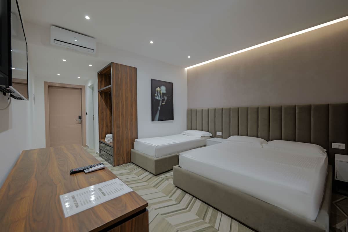 Triple Room, Sea View | 1 bedroom, premium bedding, minibar, desk